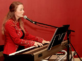 UK wedding singer Laura as she sings at the piano
